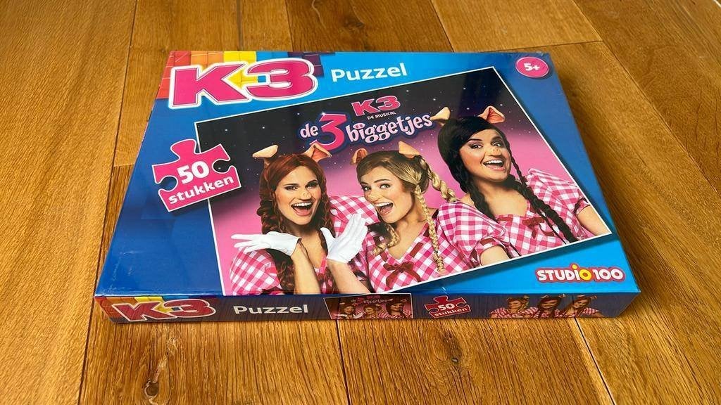 K3 puzzel 50 stuks de 3 biggetjes - nieuw in verpakking, Ophalen of Verzenden, Meer dan 50 stukjes, Nieuw, 4 tot 6 jaar
