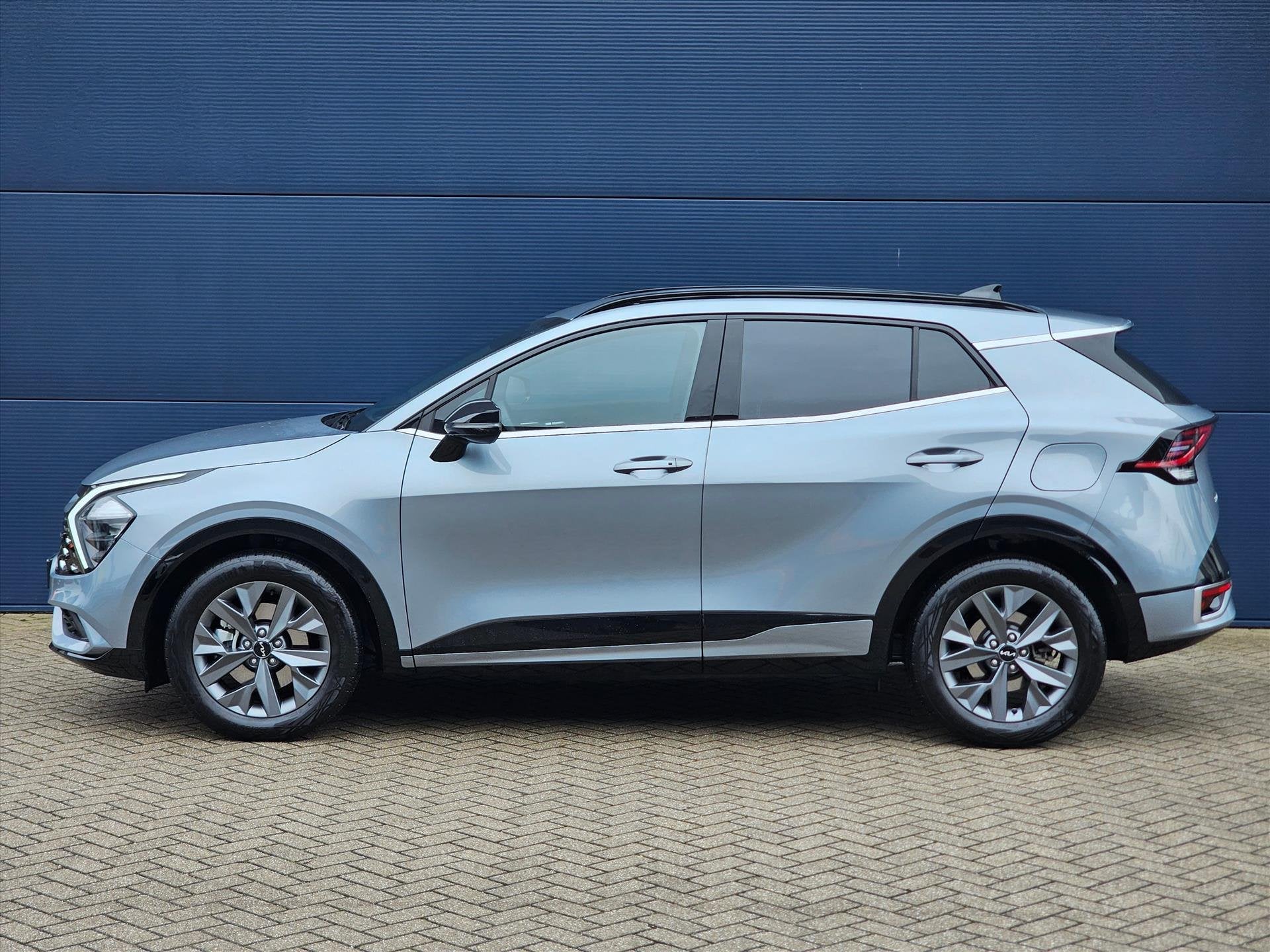 Kia Sportage 1.6 T-GDi 210pk Hybrid AT6 GT-Line Limited Edit, Auto's, Stof, Gebruikt, 4 cilinders, 1360 kg