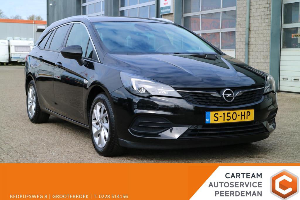 Opel Astra Sports Tourer 1.2 Blitz Edition | Camera | Carpla, Stof, Gebruikt, 1199 cc, Zwart