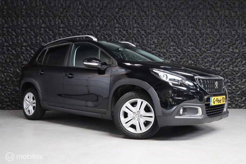 Peugeot 2008 1.2 PureTech Signature | Airco | Parkeersensor, Voorwielaandrijving, 1199 cc, Parkeersensor, Zwart