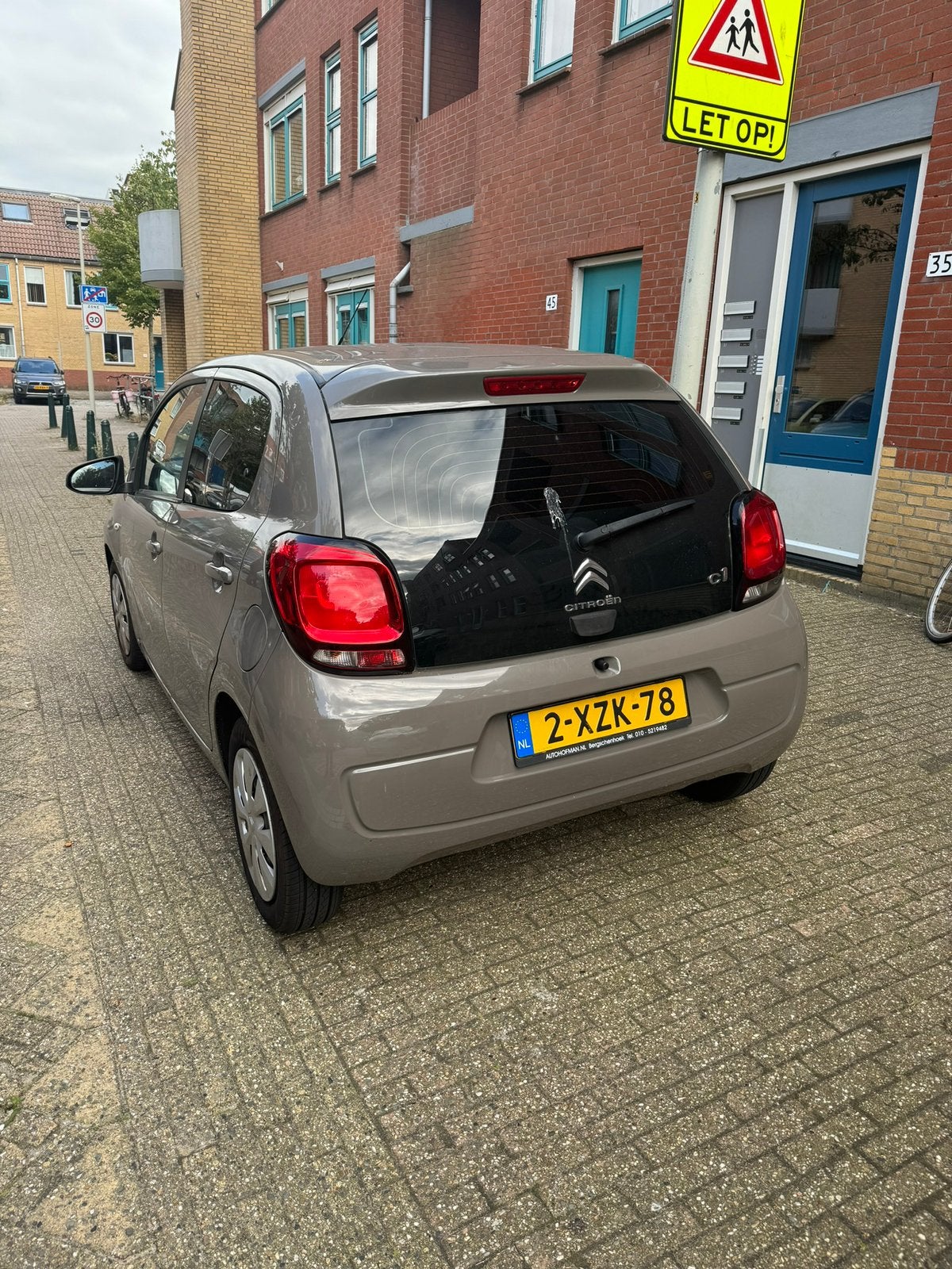 Citroën C1 1.0 E-vti 68 5-DRS 2014 Bruin lichte schade, Voorwielaandrijving, Stof, Bruin, 4 stoelen