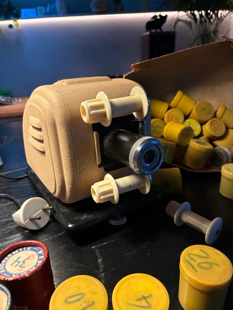 Proti filmstrookprojector met 40 filmstroken, Ophalen of Verzenden
