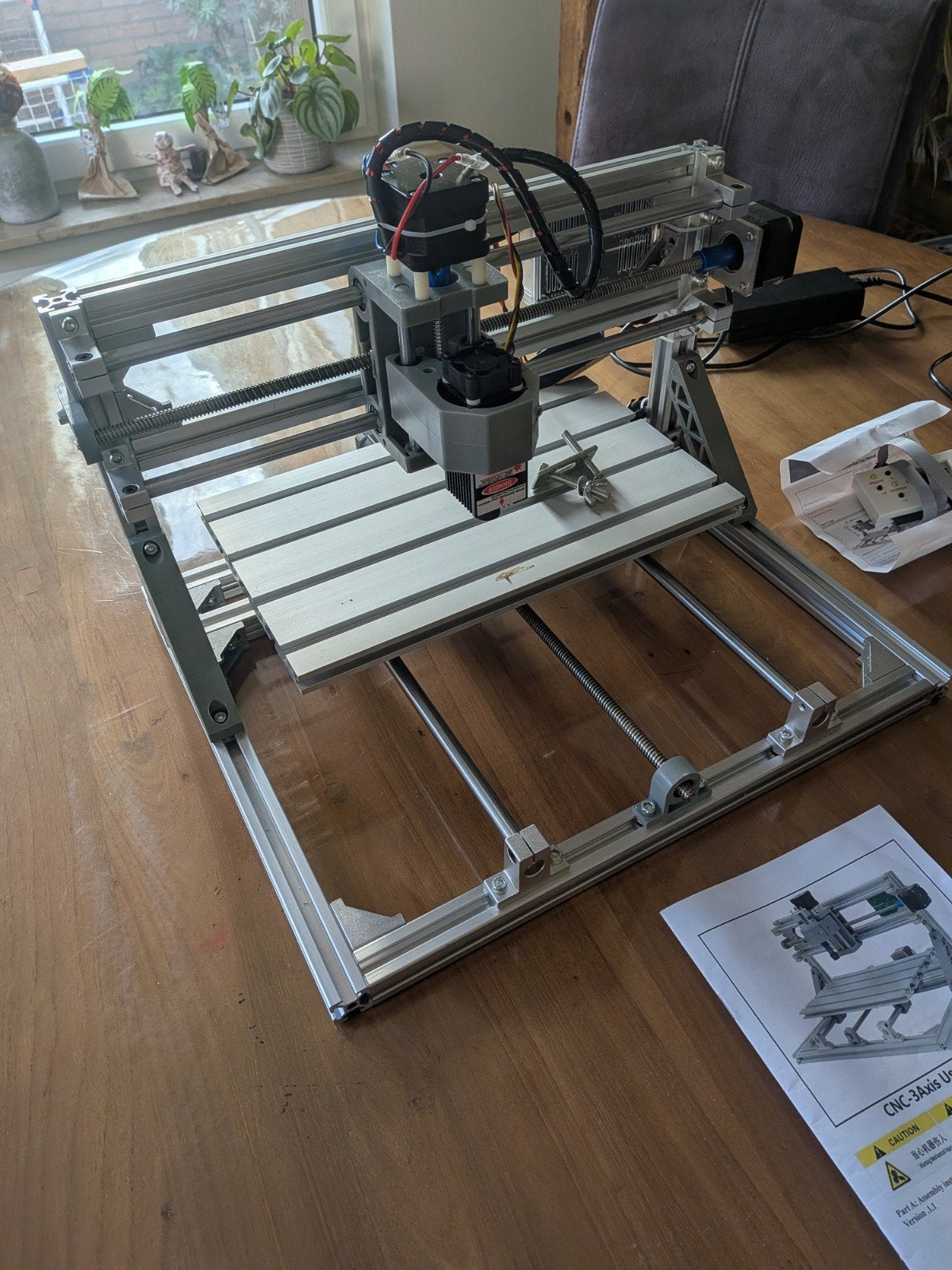 CNC graveermachine met laser en frees, Ophalen