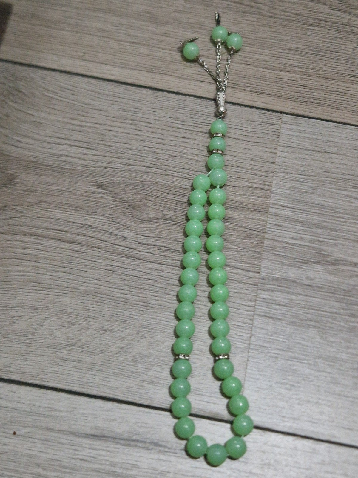 lichtgroene  tasbih., Overige materialen, Ophalen of Verzenden, Zo goed als nieuw, Met bedels of kralen