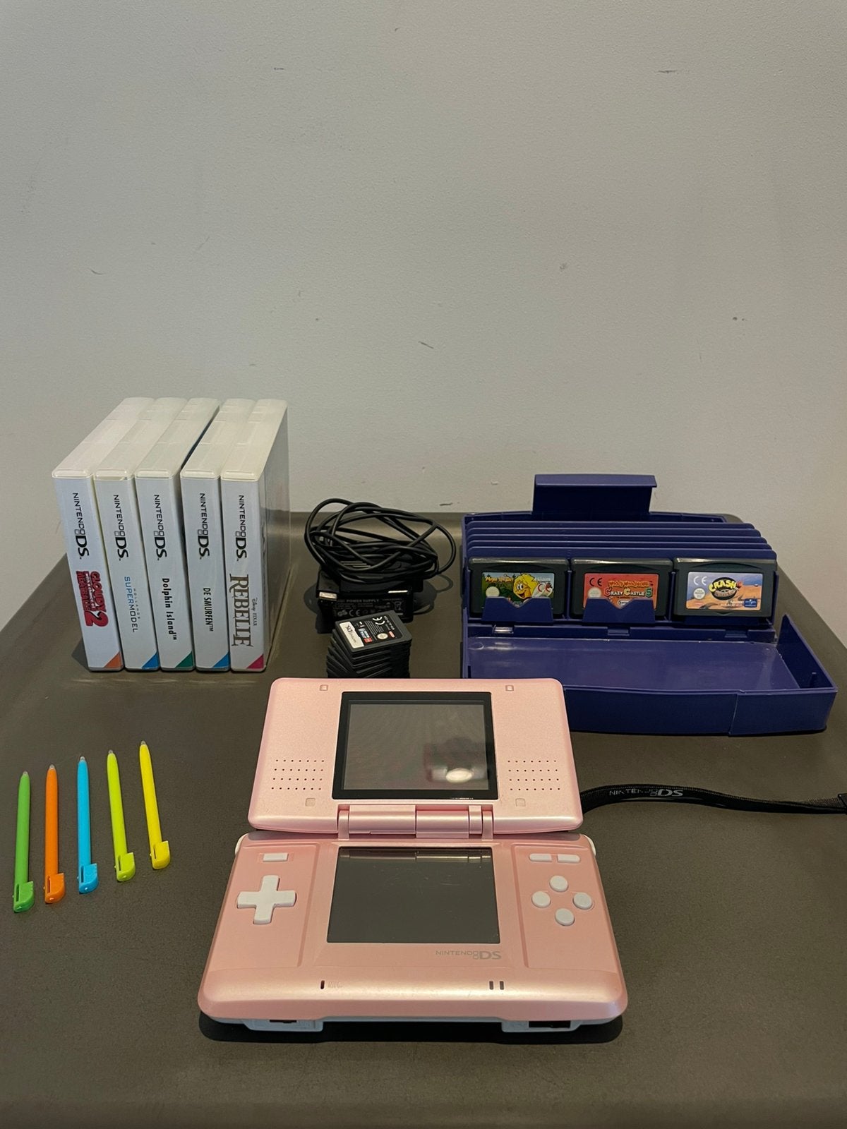 Eerste generatie Nintendo DS Phat Pink + 18 spellen, Ophalen of Verzenden, Zo goed als nieuw, Roze, DS Lite