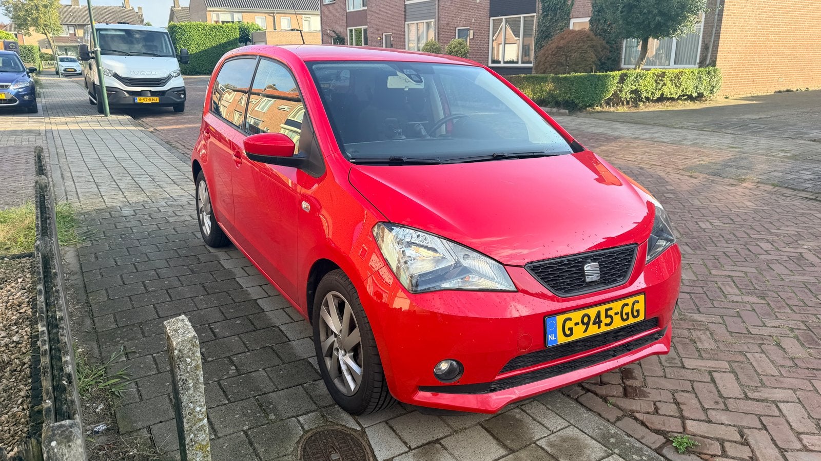 Seat Mii 1.0 44KW AUT 2013 Rood, Auto's, Stof, 4 stoelen, Mii, 23 km/l