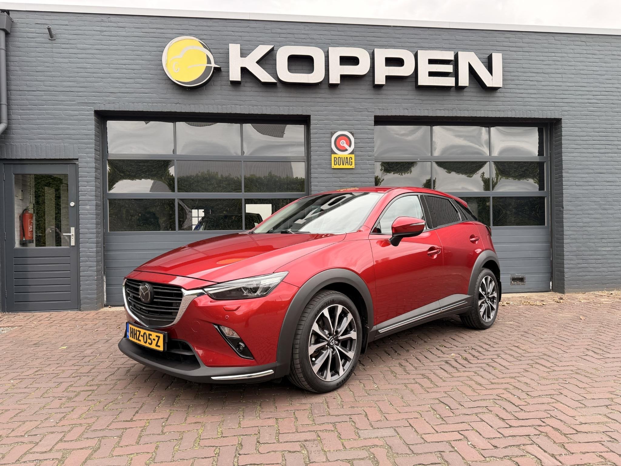 Mazda CX-3 2.0 SkyActiv-G 120 GT-M Automaat, Auto's, Gebruikt, 4 cilinders, Leder en Stof, Automatische klimaatregeling