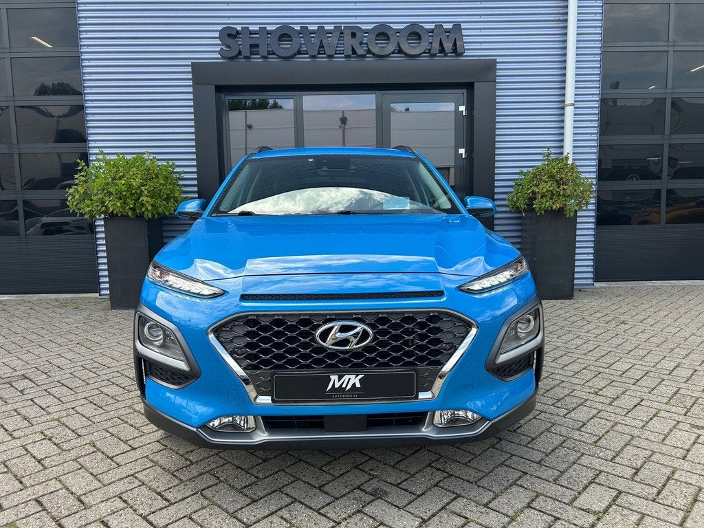 Hyundai Kona 1.6 GDI HEV Premium Automaat|Trekhaak|Camera|Na, Gebruikt, Automatische klimaatregeling, Blauw, 23 km/l