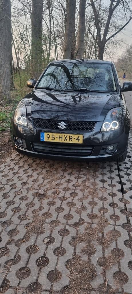 Suzuki Swift 1.3 5DRS 2009 Zwart (.NAP), Auto's, Voorwielaandrijving, 40 €/maand, 400 kg, Origineel Nederlands