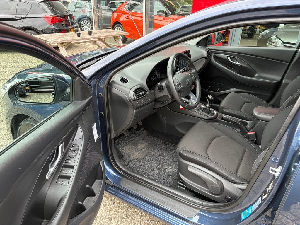 Hyundai I30 1.0 T-GDI First Edition / carplay / camera, Auto's, Hyundai, Euro 6, Blauw, Origineel Nederlands, Handgeschakeld