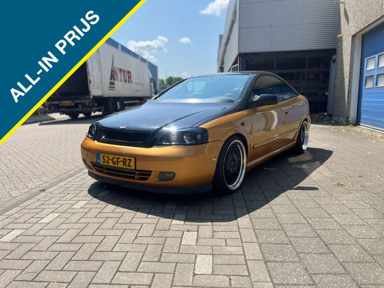 Opel Astra Coupé BERTONE NAP,Airco,Leer 1.8-16V (bj 2000), Auto's, 4 stoelen, 1796 cc, Bedrijf, 115 pk