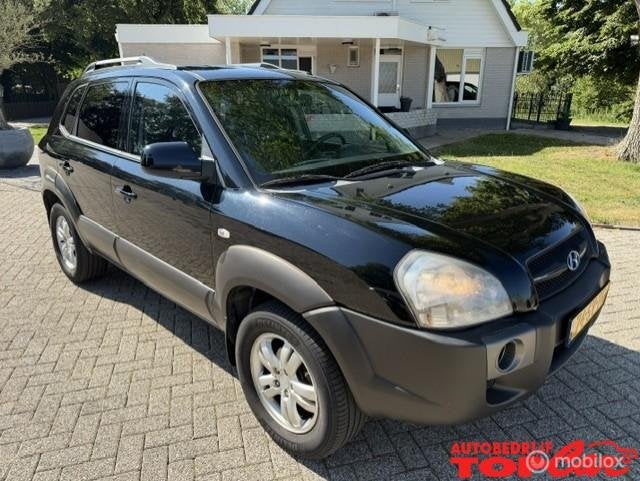 Hyundai Tucson 2.0i Style, Auto's, Hyundai, Gebruikt, 4 cilinders, Zwart, Handgeschakeld