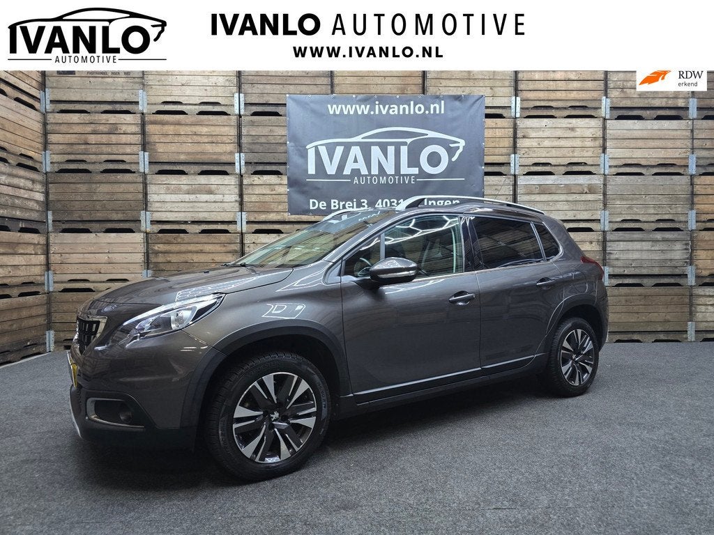 Peugeot 2008 1.2 PureTech Allure Pano Trekhaak Clima Navi Ca, Auto's, Peugeot, Voorwielaandrijving, Parkeersensor, Leder en Stof