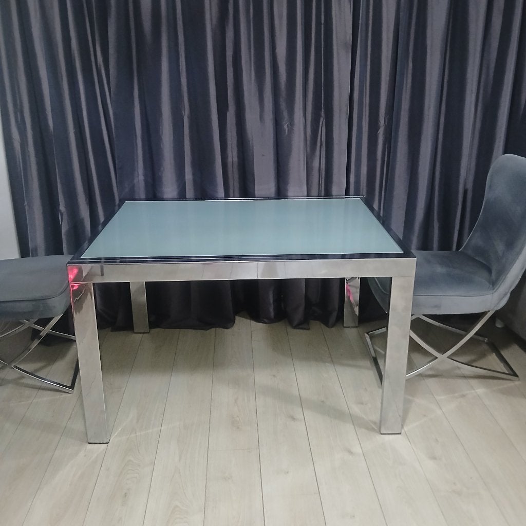 Glazen uitschuifbare eettafel., Huis en Inrichting, Ophalen, Gebruikt, 100 tot 150 cm, Glas