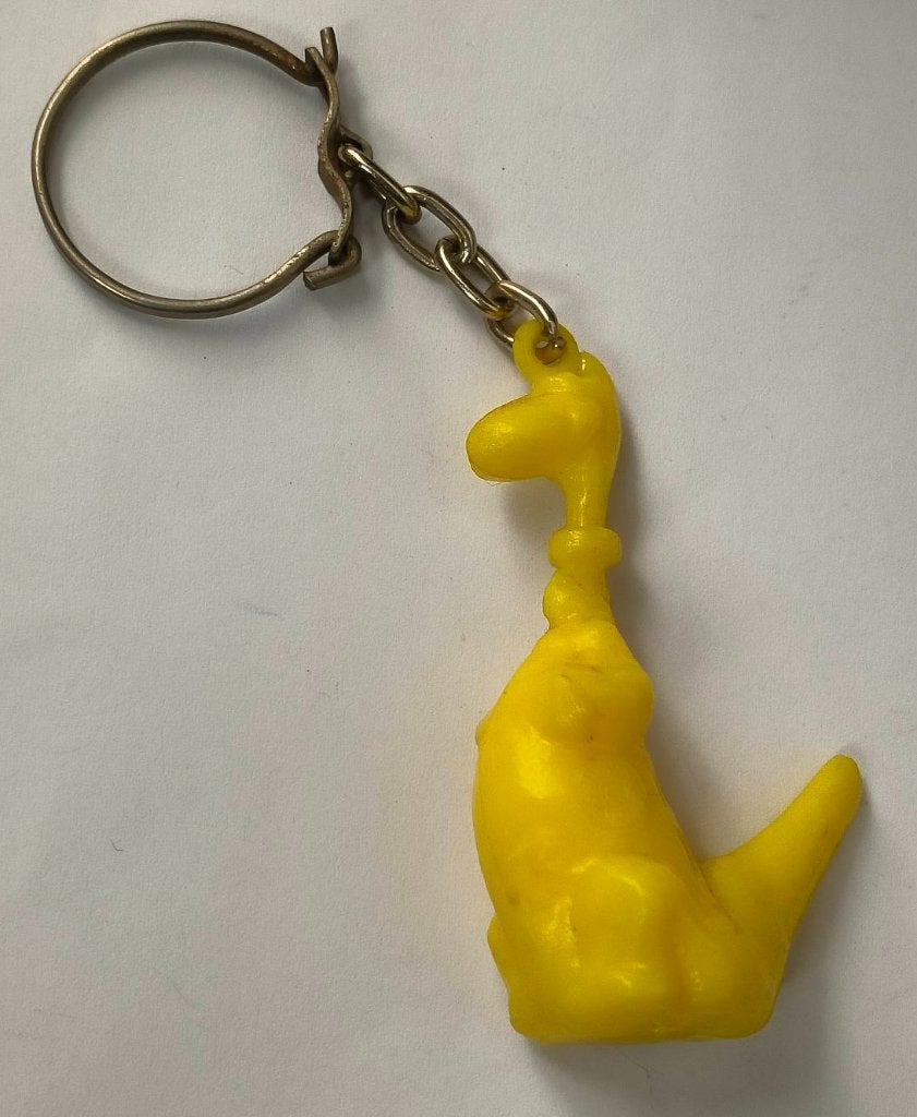 Dino ( uit Flintstones ) sleutelhanger (geel), Ophalen of Verzenden, Zo goed als nieuw, Knuffel of Figuurtje