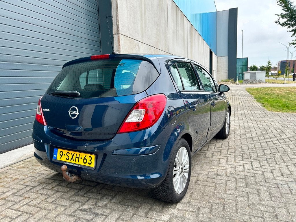 Opel Corsa 1.2i 16V Cosmo AIRCO G3 NAVI PDC 5DRS, Voorwielaandrijving, Euro 5, 86 pk, Gebruikt