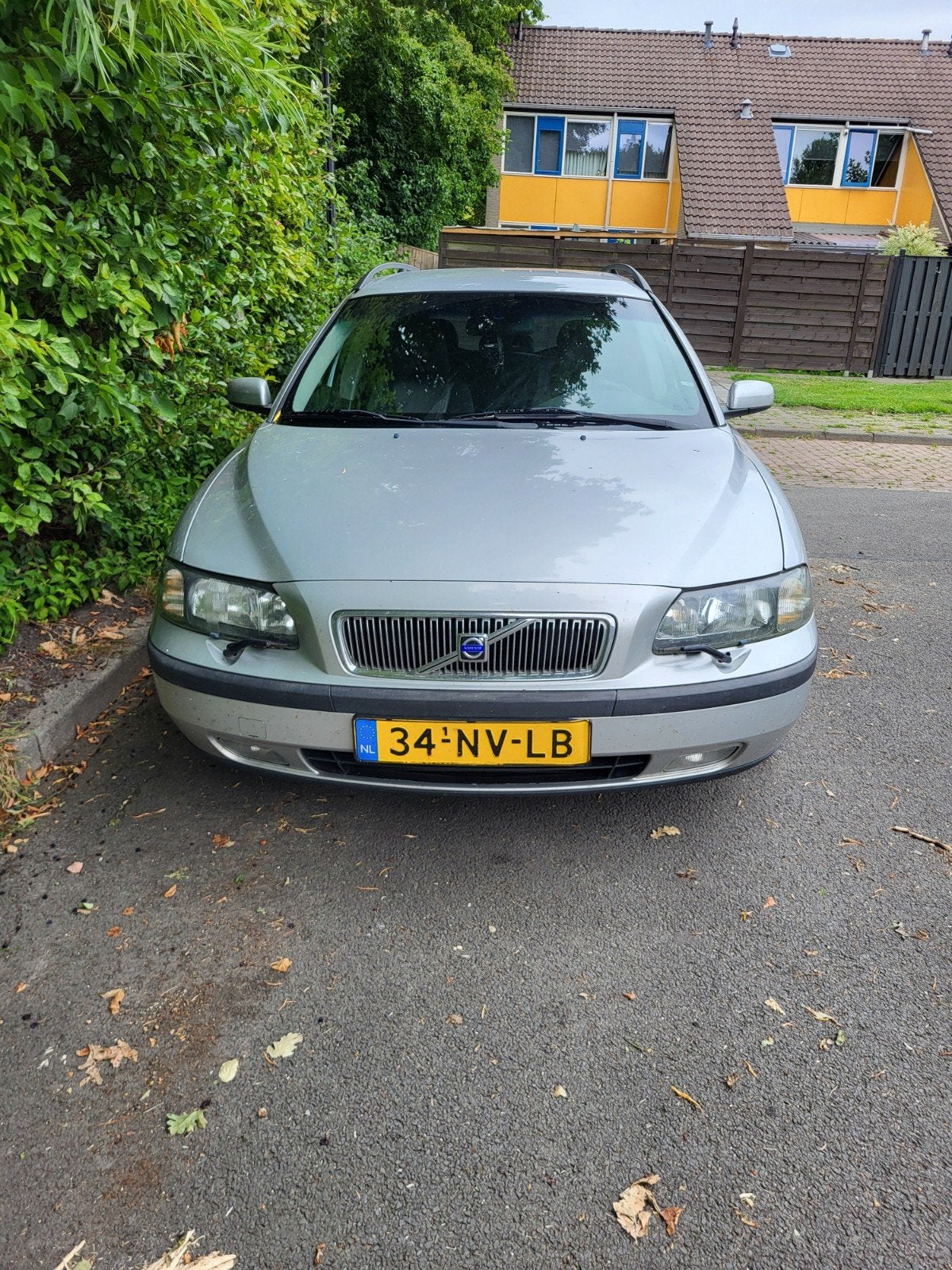 Volvo V70 2.4 170PK AUT 2004 Grijs, Auto's, Volvo, 1556 kg, 1800 kg, Zwart, Leder en Stof