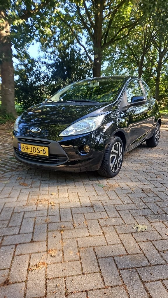 Ford Ka 1.2 51KW 2009 Zwart, Auto's, Voorwielaandrijving, Stof, 1242 cc, 4 cilinders