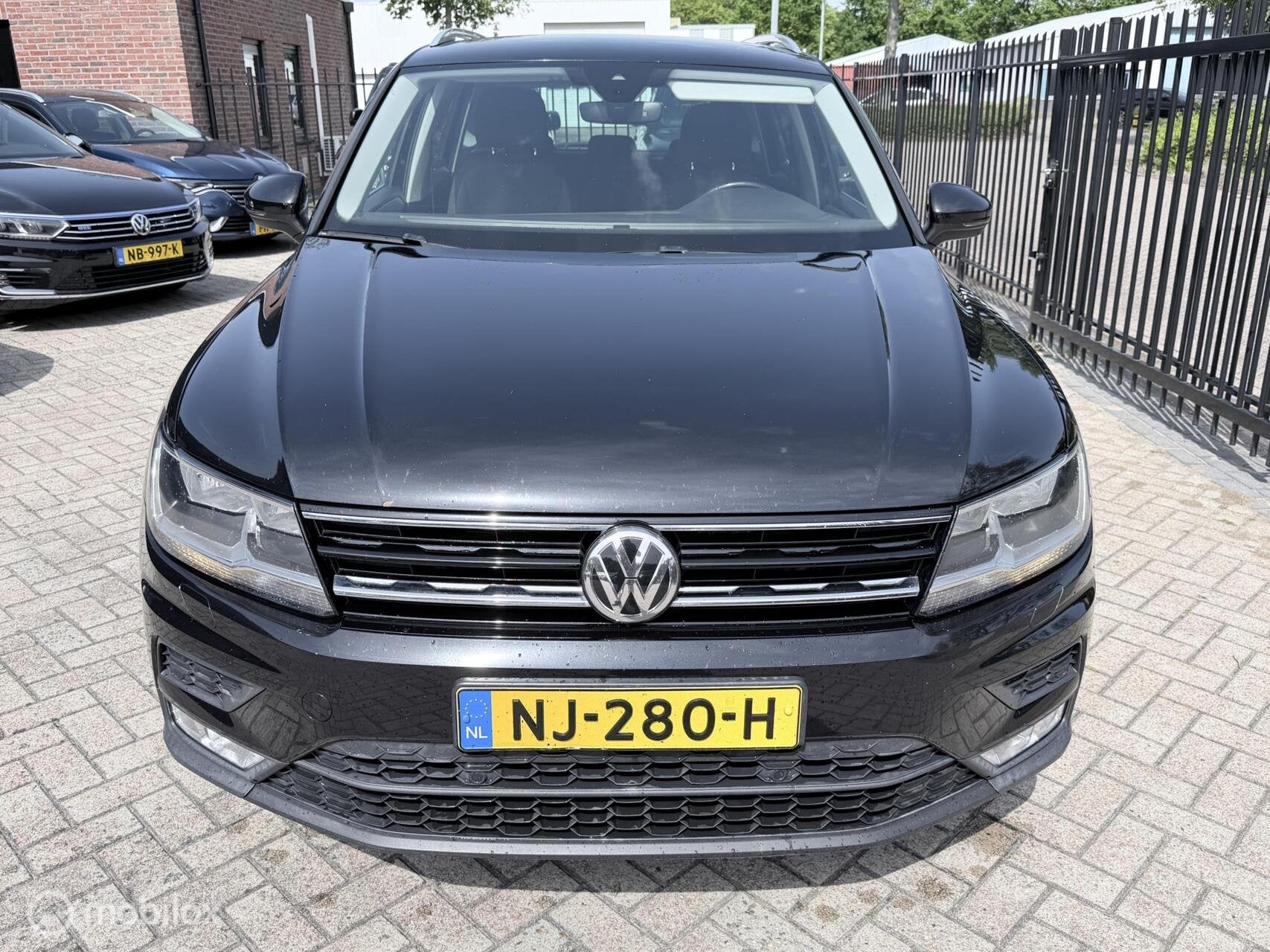 Volkswagen Tiguan 2.0 TDI Comfortline NAVI / ELEKTR.TREKHAAK, Auto's, Gebruikt, Euro 6, 4 cilinders, Zwart