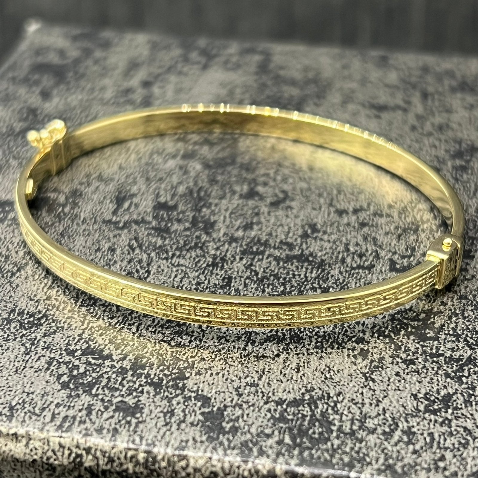 14 karaats gouden armband versace schakel, Ophalen of Verzenden, Zo goed als nieuw, Goud