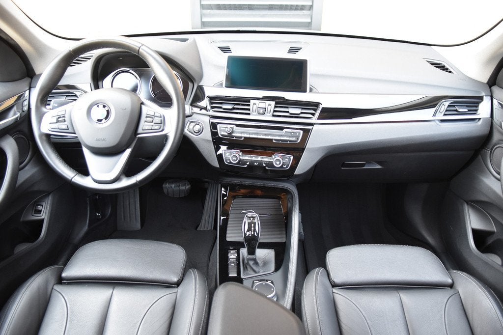 BMW X1 sDrive20i High Executive (bj 2018, automaat), Auto's, BMW, 1998 cc, Met garantie (alle), Bedrijf, Automatische klimaatregeling