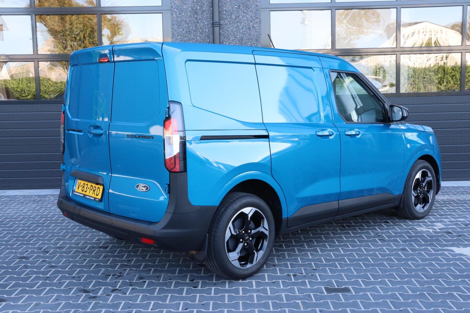 Ford E-Transit Cour. Limited 44 kWh l FULL OPTION l NAVI l C, Dealer onderhouden, Gebruikt, Blauw, 44 kWh