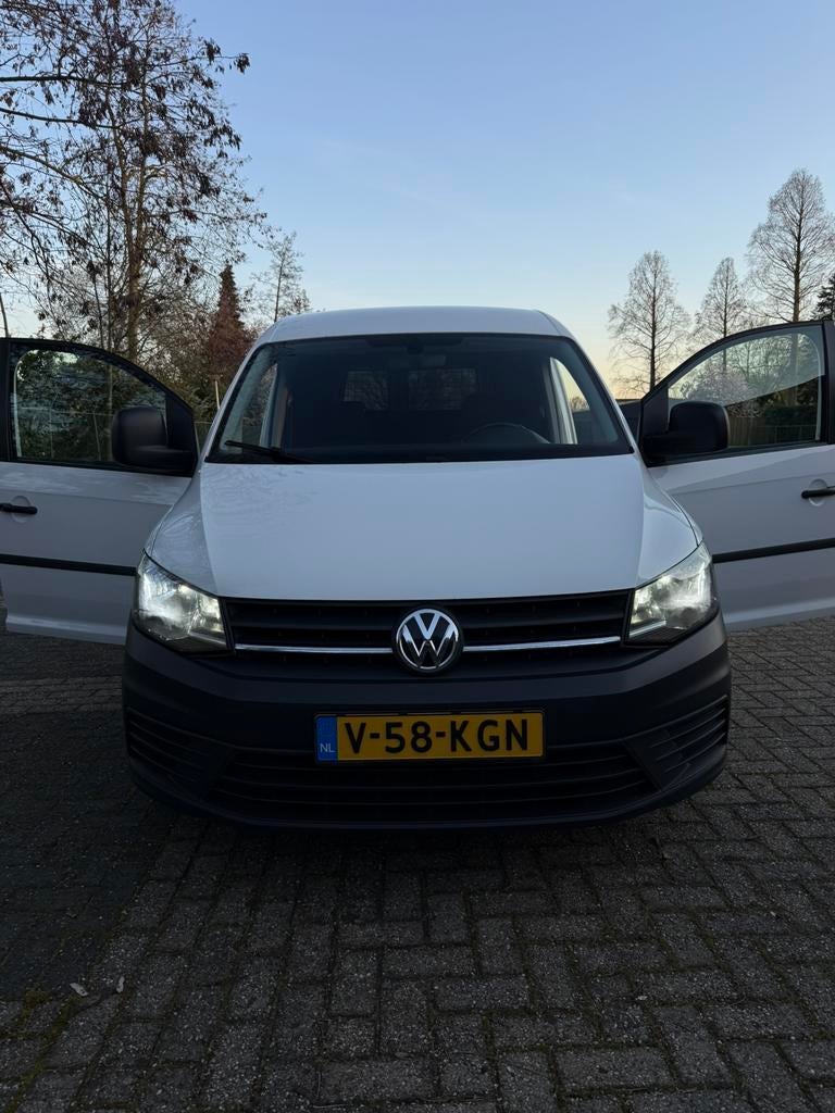 Volkswagen Caddy 2.0 TDI 2016 Wit NIEUWE DISTRIB & KOPPELING, Auto's, Voorwielaandrijving, 4 cilinders, Volkswagen, Alcantara