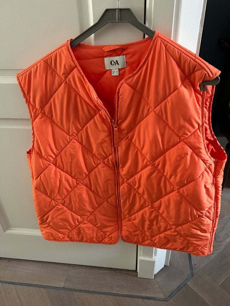 Bodywarmer dames, Ophalen of Verzenden, Zo goed als nieuw, Maat 42/44 (L), Oranje