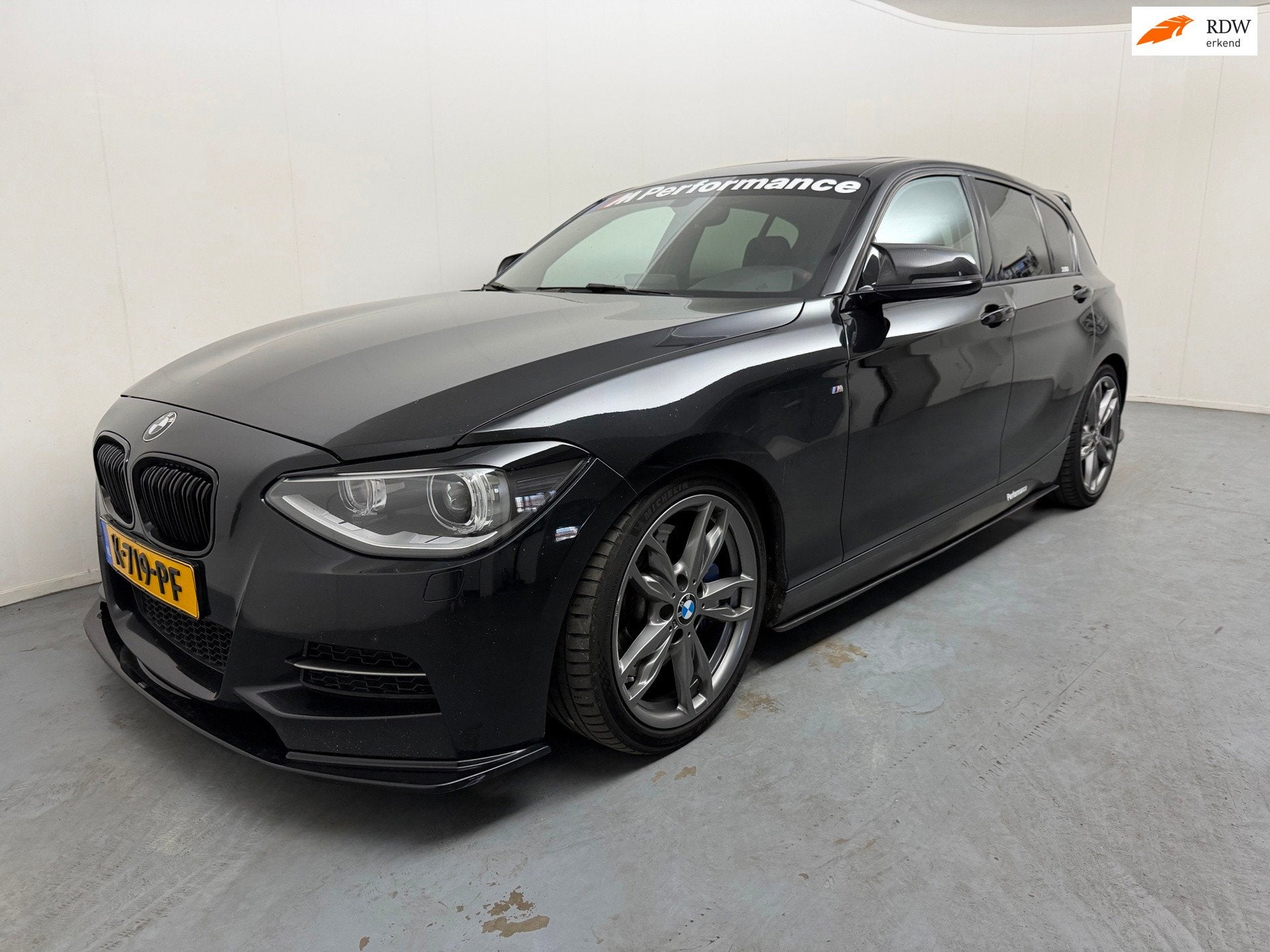 BMW 1-serie M135i xDrive High Executive # 420 PK # Remus uit, Euro 5, Gebruikt, 320 pk, Zwart