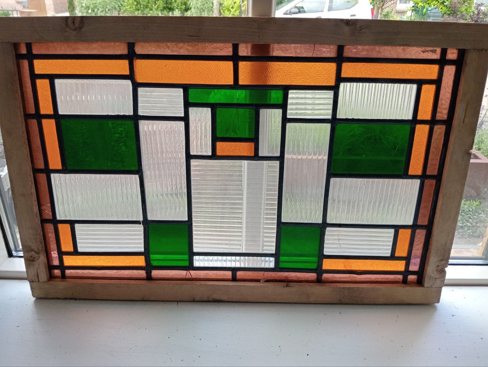 Oud glas in loodraam met ouderdoms barstjes €25, Ophalen