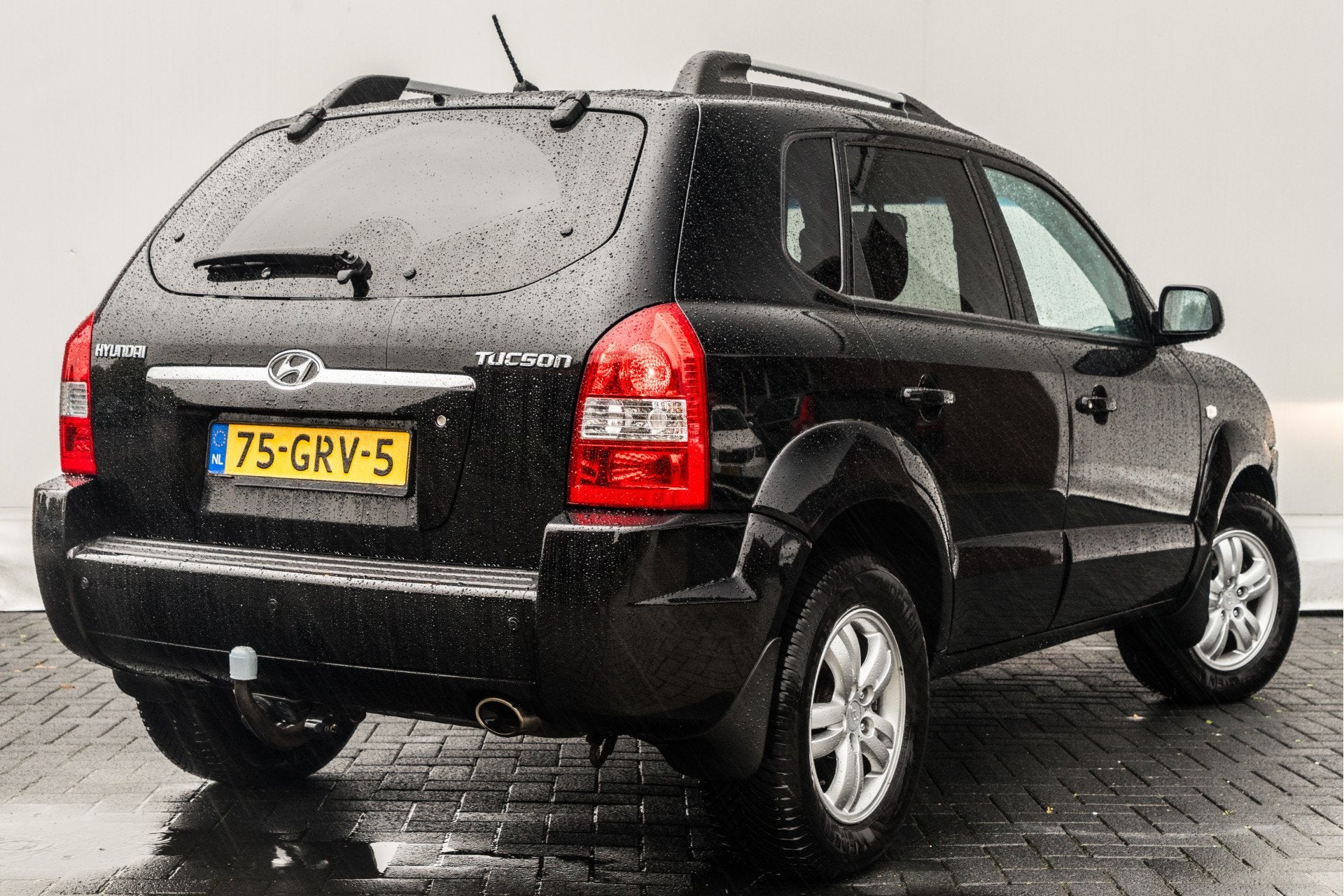 Hyundai Tucson 2.0i 142 PK Style Executive |NED Auto | Hoge, Stof, Gebruikt, Zwart, 4 cilinders