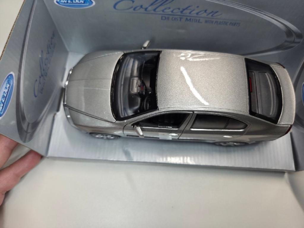 Welly Skoda Octavia a5 Modelauto 1:24 - Zilver, Ophalen of Verzenden, Nieuw, Auto, Welly