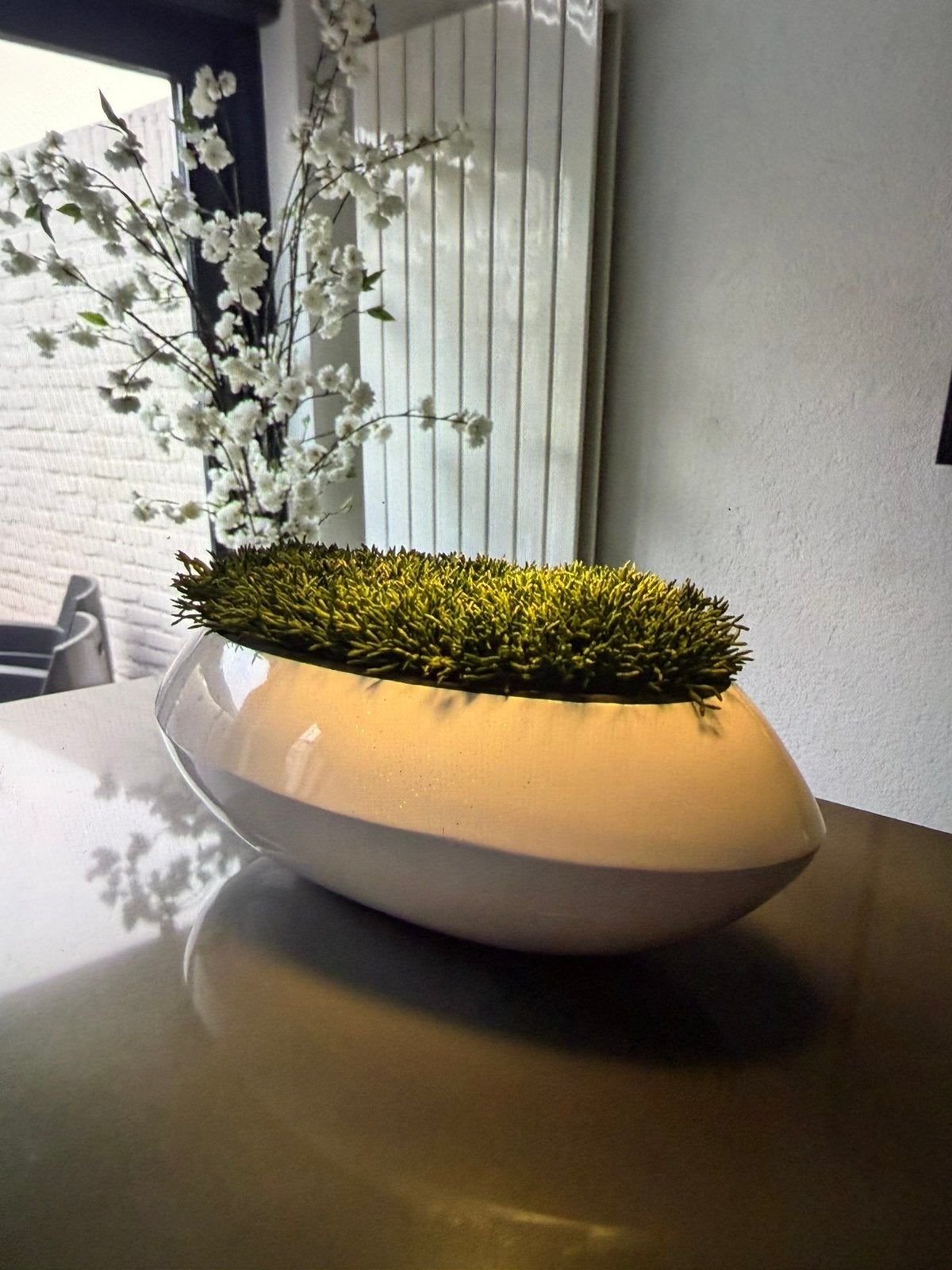 Design pot met kunstplant, Ophalen