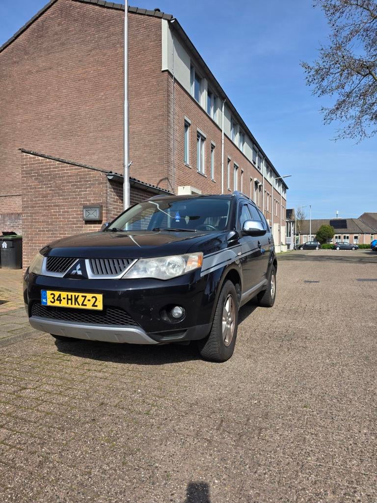 Mitsubishi Outlander 2.4 MPI 2WD 2009 Zwart, Voorwielaandrijving, Stof, Outlander, 4 cilinders