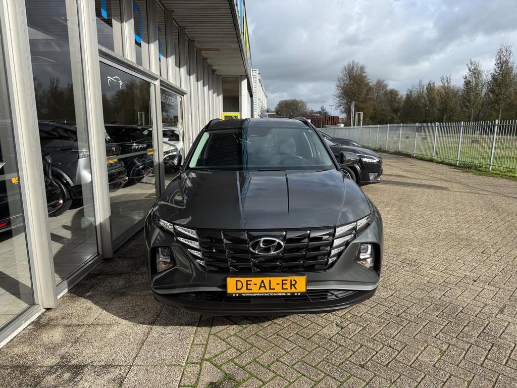 Hyundai Tucson 1.6 T-GDI PHEV Comfort 4WD 265PK / ACHTERUITR, Automaat, Stof, Zwart, 4 cilinders