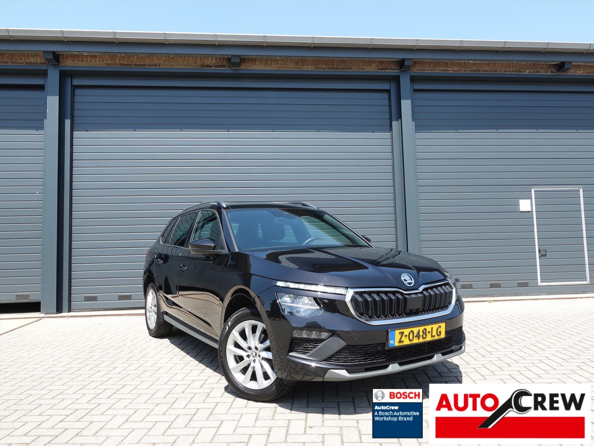 Skoda Kamiq 1.0 TSI DSG-7 Sport Business RIJKLAAR/PANORAMA/C, Gebruikt, Zwart, Origineel Nederlands, 3 cilinders