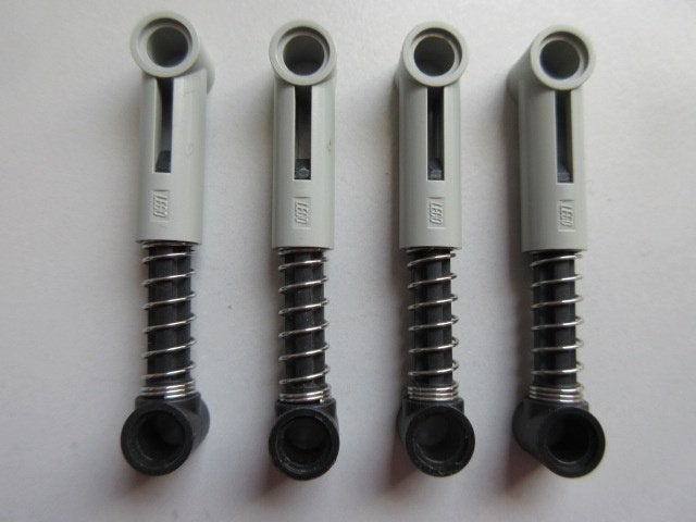 nr. 1429, 4 old gray schokdempers, 731c01, Ophalen of Verzenden, Zo goed als nieuw, Complete set, Lego