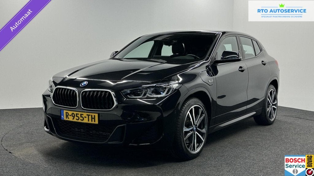 BMW X2 xDrive25e High Executive M-Sport|SOH 92%|LEER HEAD-UP, Auto's, BMW, Automaat, Gebruikt, Met garantie (alle), Zwart