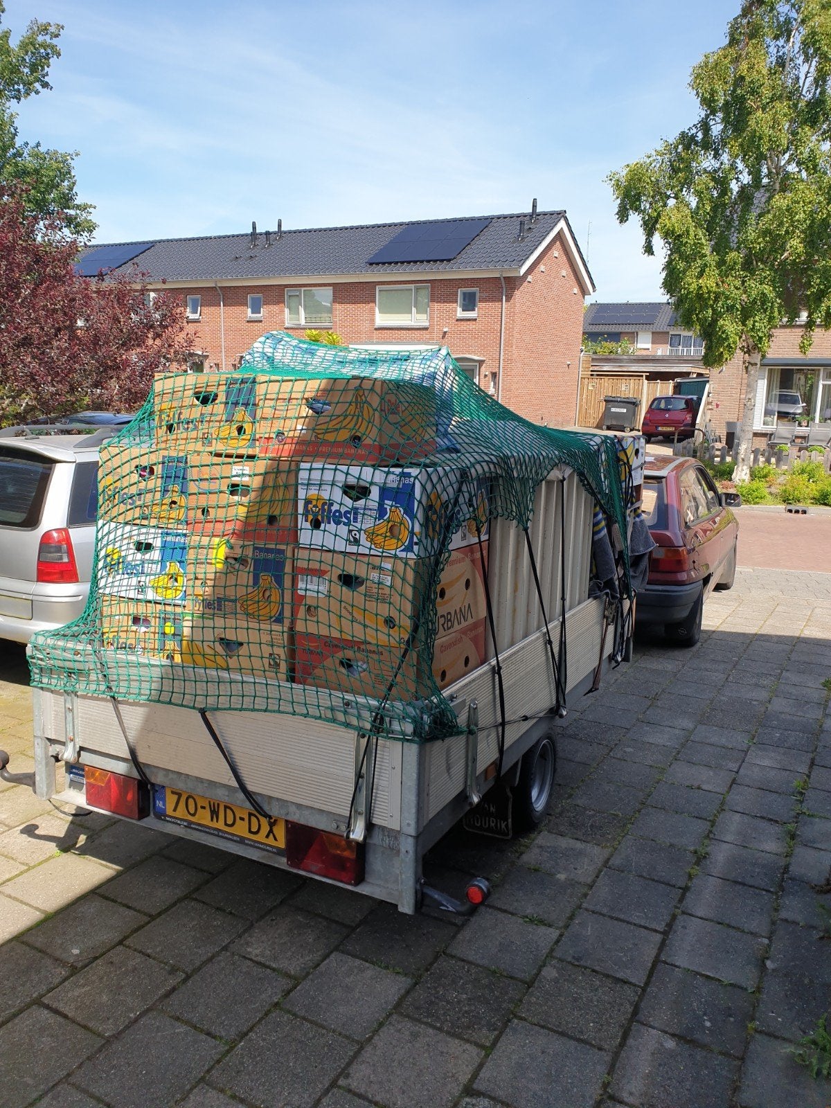 15 dozen nieuwe kleding en schoenen en slippers, Ophalen