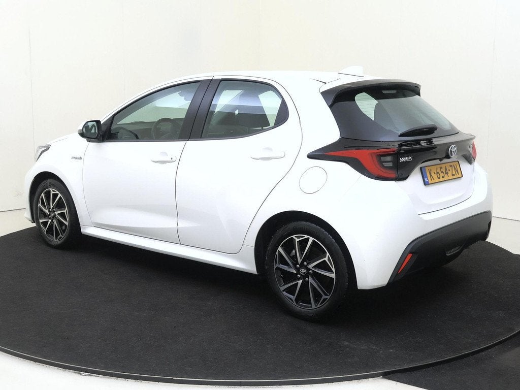Toyota Yaris 1.5 Hybrid Dynamic 116PK | Navigatie | Lichtmet, Auto's, Toyota, Gebruikt, Euro 6, Bedrijf, Hybride Elektrisch/Benzine