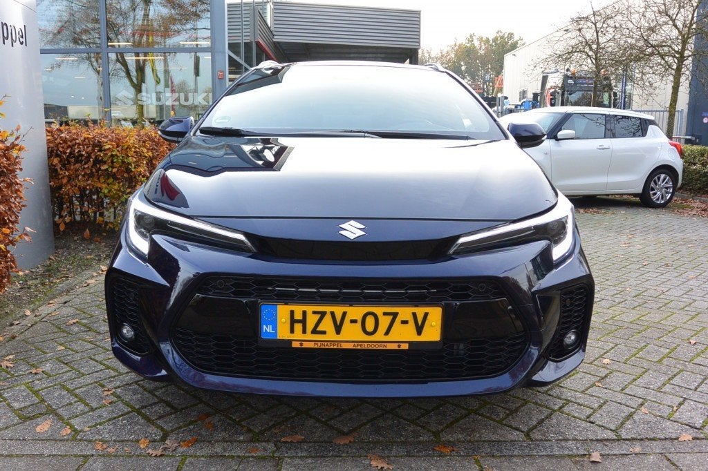 Suzuki SWACE 1.8 Hybrid Style AUTOMAAT, Auto's, 450 kg, 4 cilinders, Met garantie (alle), Blauw