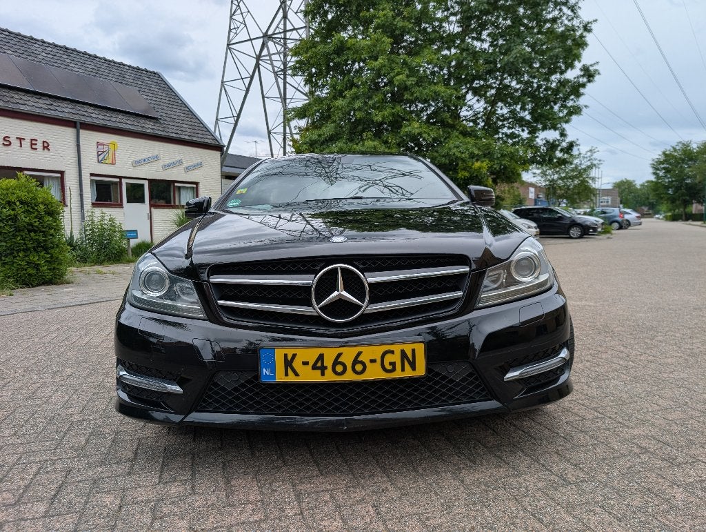 Mercedes-Benz C-Klasse C180 BE Coupe Aut7 2015 Zwart, Auto's, Automaat, Achterwielaandrijving, 1800 kg, 4 stoelen