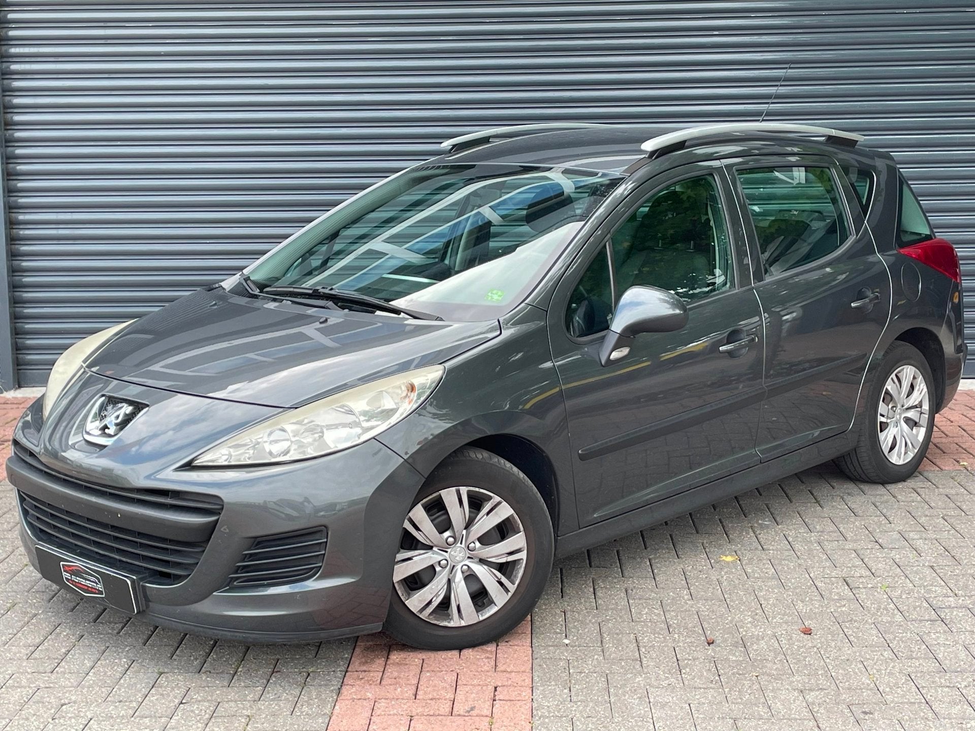 Peugeot 207 SW 1.4 VTi X-line Trekhaak | Airco | Cruise | El, Auto's, Voorwielaandrijving, Stof, Gebruikt, Zwart