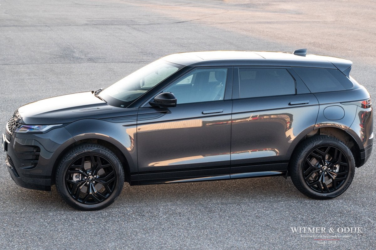 Land Rover Range Rover Evoque 1.5 P300e AWD Black Pack, Pano, Auto's, Automaat, Zwart, Leder, Bedrijf