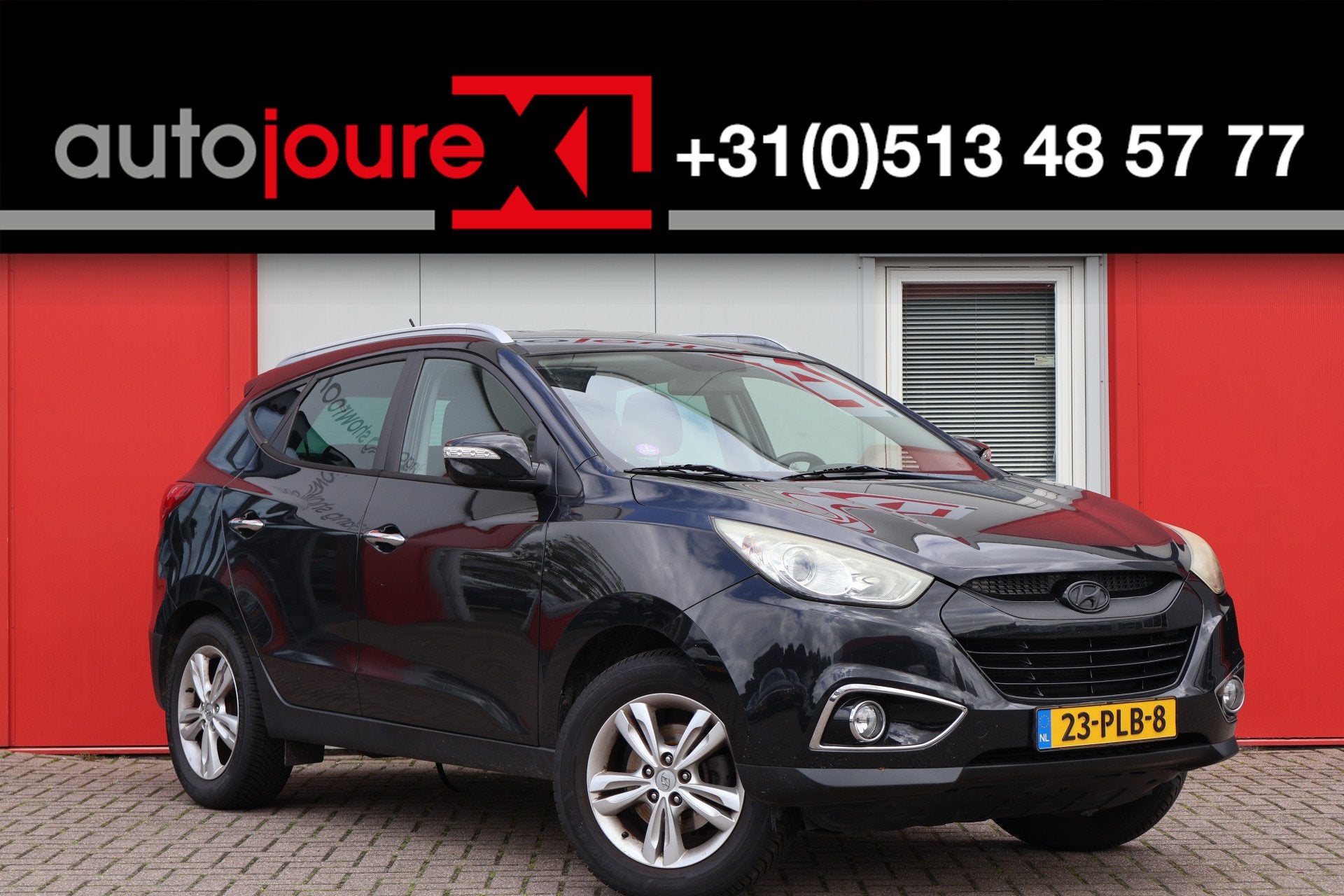 Hyundai ix35 2.0i Style (bj 2011), Auto's, Gebruikt, Zwart, 4 cilinders, Leder en Stof