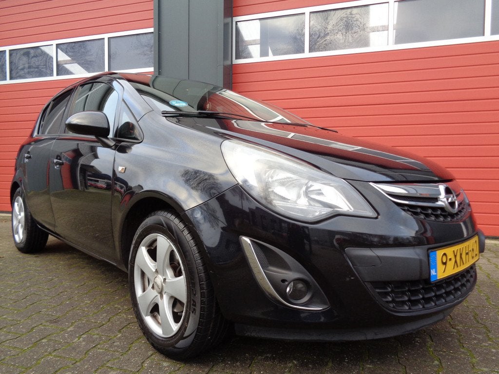 Opel Corsa 1.2-16V BlitZ 86PK Airco Cruise Navi LMV Half-Lee, Auto's, Voorwielaandrijving, Euro 5, Gebruikt, 4 cilinders