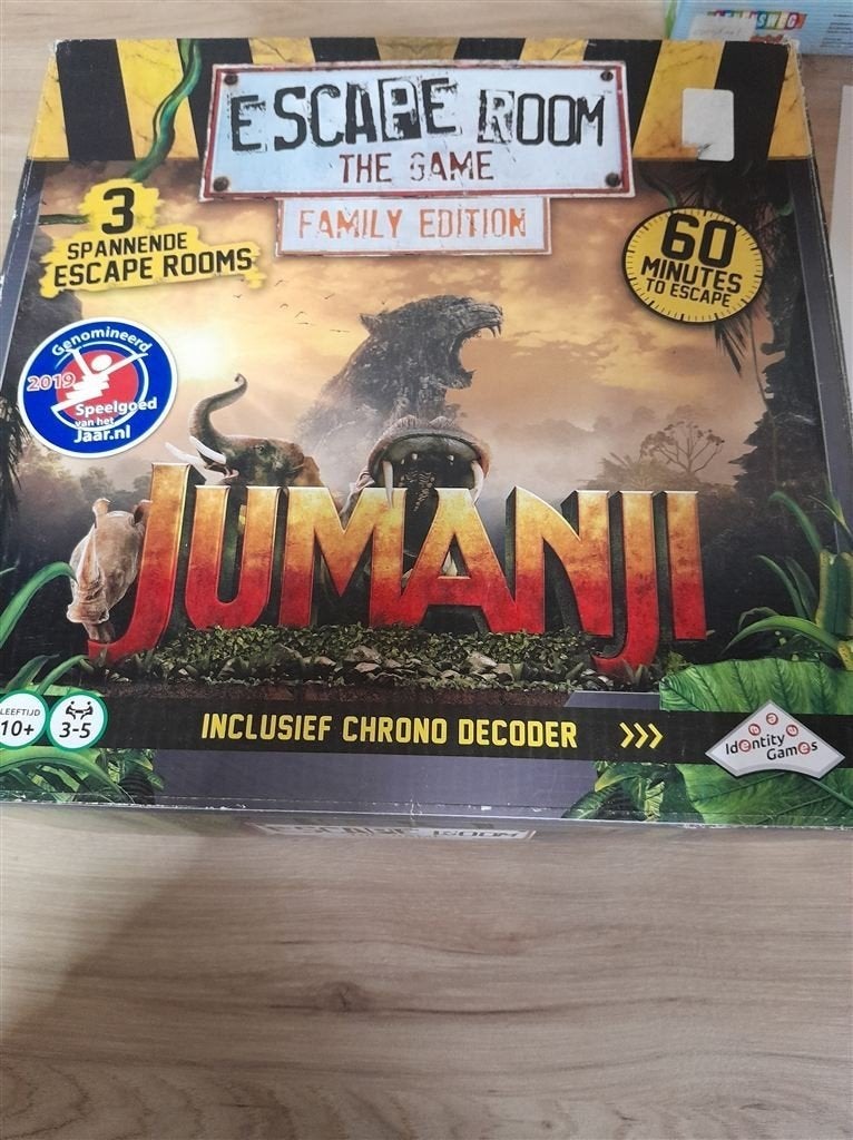 Escape room the game - family editie - jumanji - s3987, Hobby en Vrije tijd, Gezelschapsspellen | Bordspellen, Verzenden, Zo goed als nieuw
