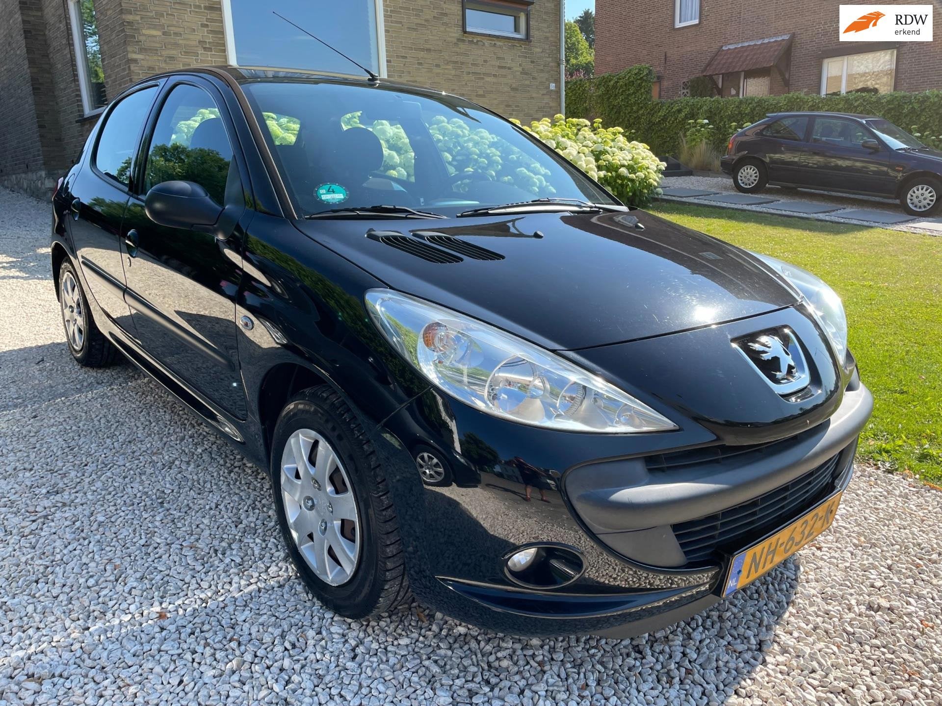 Peugeot 206 + 1.4 Urban Move Airco/Nwe Distributie&APK., Auto's, Stof, Zwart, 4 cilinders, Zwart