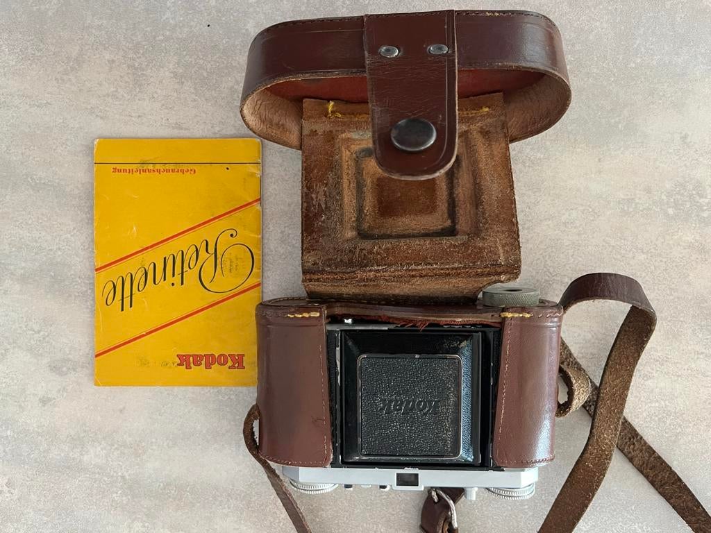 Vintage Kodak Retinette camera met lederen tas en handleidin, Ophalen, Gebruikt, Compact, Kodak
