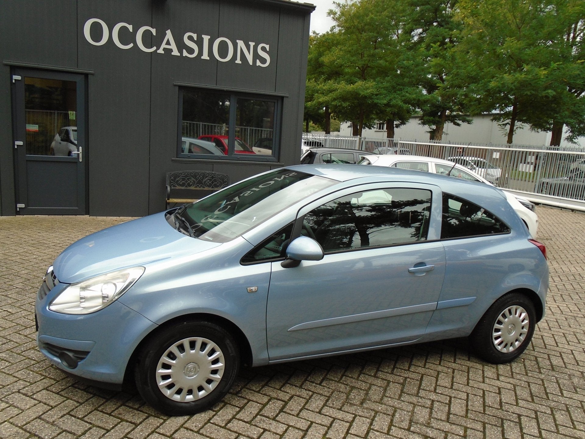 Opel Corsa 1.2-16V Essentia, Auto's, Voorwielaandrijving, Zwart, 4 cilinders, Blauw